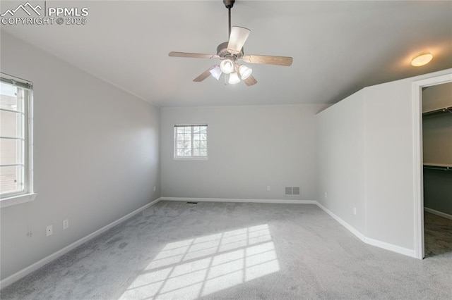 3355 Willowrun Dr, Castle Rock, CO 80109 - unfurnished bedroom featuring carpet flooring, a spacious closet, and ceiling fan