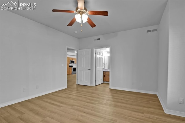 4888 Kerry Lynn Way Unit 101, Colorado Springs, CO 80922 - unfurnished bedroom with light wood-style floors, ensuite bathroom, and ceiling fan