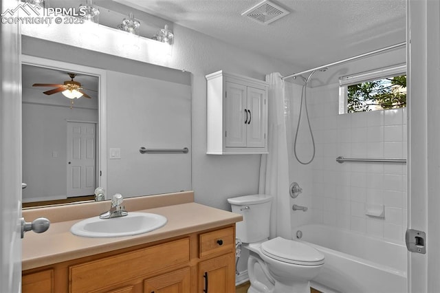 4888 Kerry Lynn Way Unit 101, Colorado Springs, CO 80922 - bathroom featuring vanity, tub / shower combination, a textured ceiling, and a ceiling fan