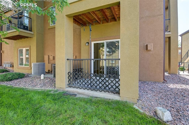 4888 Kerry Lynn Way Unit 101, Colorado Springs, CO 80922 - entrance to property featuring stucco siding and a balcony