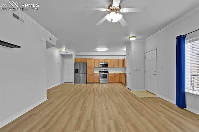 4888 Kerry Lynn Way Unit 101, Colorado Springs, CO 80922 - kitchen featuring stainless steel appliances, a ceiling fan, light wood finished floors, crown molding, and light countertops