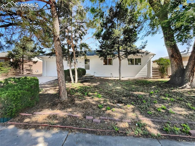 307 Mount View Ln, Fountain, CO 80817 - view of front of property with an attached garage and driveway