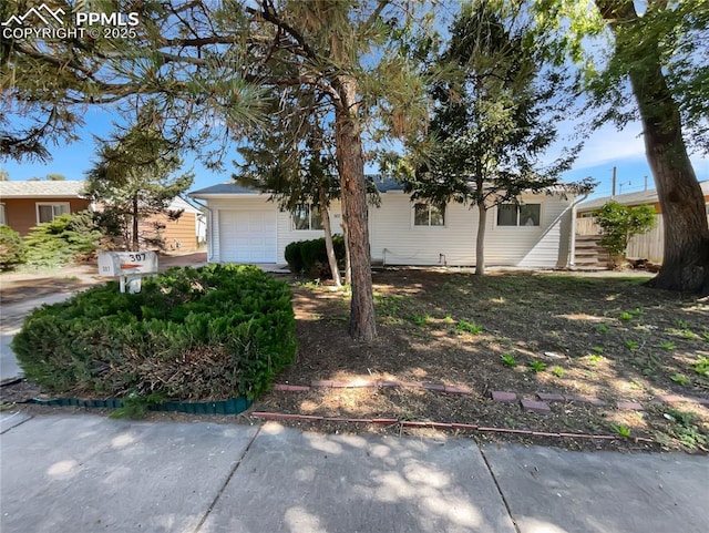 307 Mount View Ln, Fountain, CO 80817 - view of property exterior with an attached garage
