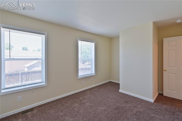 4400 Rawhide Rd Unit 157, Pueblo, CO 81008 - unfurnished room featuring carpet and a smoke detector