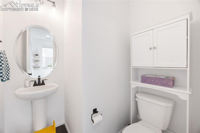 16423 Mountain Flax Dr, Monument, CO 80132 - bathroom featuring toilet and a sink