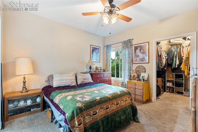 3847 Riviera Grv Unit 102, Colorado Springs, CO 80922 - carpeted bedroom featuring a walk in closet, a closet, and ceiling fan
