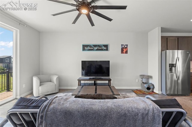 2481 Horsemanship Ct, Colorado Springs, CO 80922 - living room with a ceiling fan and baseboards