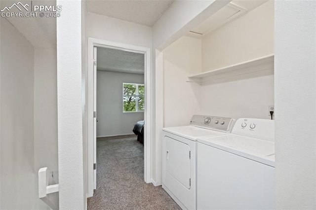 1275 Soaring Eagle Dr, Colorado Springs, CO 80915 - laundry area featuring independent washer and dryer, light colored carpet, and a textured ceiling