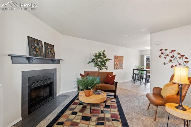 1275 Soaring Eagle Dr, Colorado Springs, CO 80915 - living room with a fireplace and baseboards