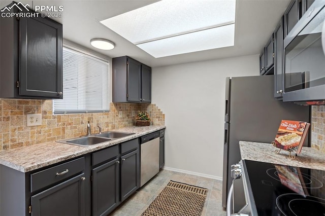 1275 Soaring Eagle Dr, Colorado Springs, CO 80915 - kitchen featuring stainless steel appliances, tasteful backsplash, and light countertops