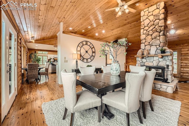 1527 S Pine Dr, Bailey, CO 80421 - dining area with rustic walls, light wood-type flooring, wooden ceiling, lofted ceiling, and ceiling fan