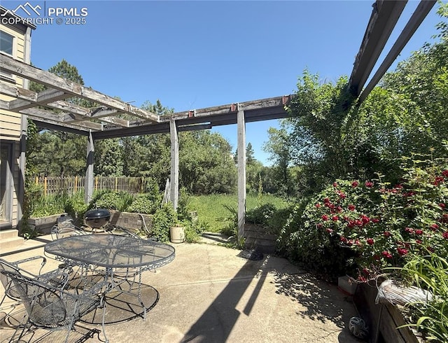 945 Marlstone Pl, Colorado Springs, CO 80904 - view of patio / terrace featuring a pergola and outdoor dining space