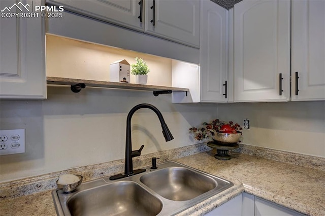 4110 Undimmed Cir, Colorado Springs, CO 80917 - kitchen with white cabinets and light countertops