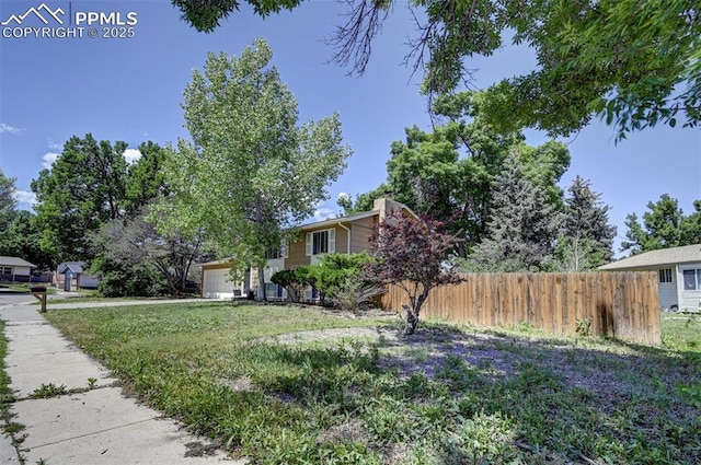 4110 Undimmed Cir, Colorado Springs, CO 80917 - view of front facade with an attached garage