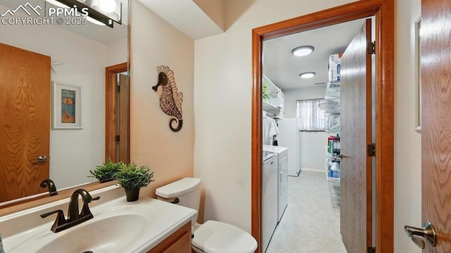 440 Torrey Pines Way, Colorado Springs, CO 80921 - bathroom with separate washer and dryer and vanity
