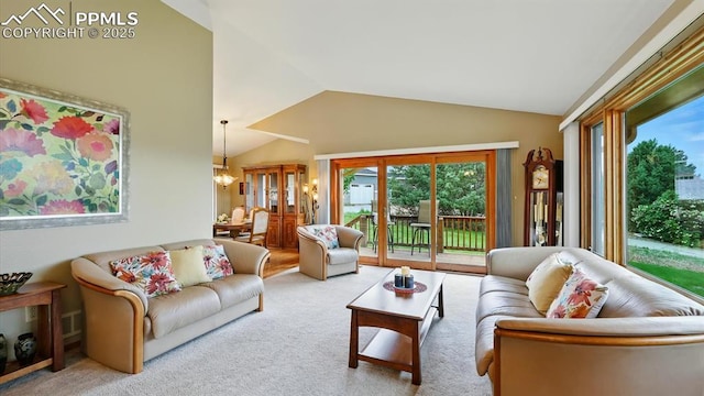 440 Torrey Pines Way, Colorado Springs, CO 80921 - carpeted living area featuring vaulted ceiling and a chandelier