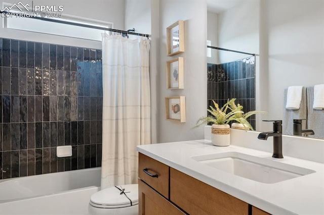 9996 Antelope Ravine Dr, Colorado Springs, CO 80908 - bathroom with vanity and shower / bath combo with shower curtain