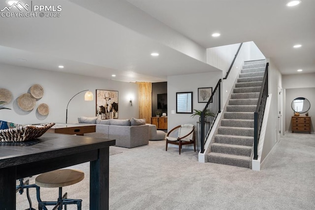 9996 Antelope Ravine Dr, Colorado Springs, CO 80908 - carpeted living room featuring recessed lighting and stairway