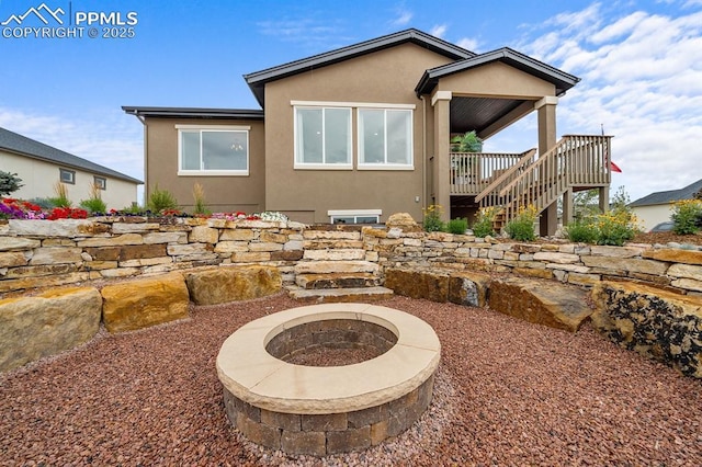 9996 Antelope Ravine Dr, Colorado Springs, CO 80908 - view of patio featuring stairs and a wooden deck