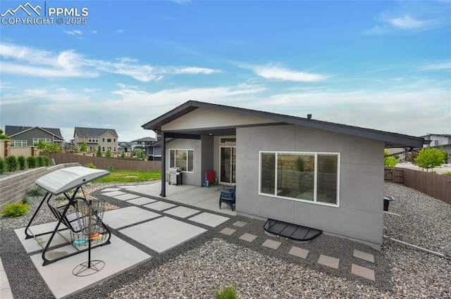 4841 Hanging Lake Cir, Colorado Springs, CO 80924 - back of house featuring a fenced backyard and a patio