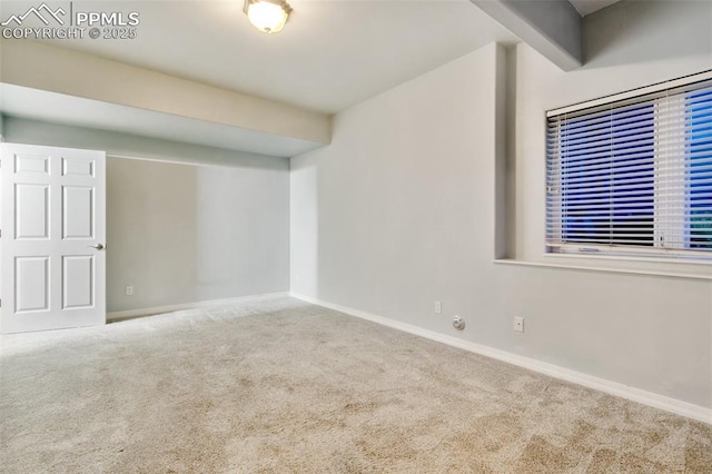 6972 Granite Peak Dr, Colorado Springs, CO 80923 - carpeted empty room featuring baseboards