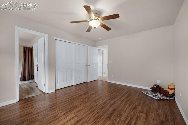 7665 Manston Dr, Colorado Springs, CO 80920 - unfurnished bedroom with dark wood-type flooring, ceiling fan, and a closet