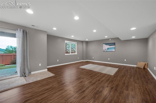 7665 Manston Dr, Colorado Springs, CO 80920 - empty room with wood finished floors and recessed lighting