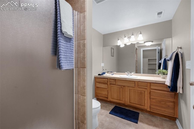 7665 Manston Dr, Colorado Springs, CO 80920 - bathroom featuring vanity, tile patterned flooring, and a shower stall