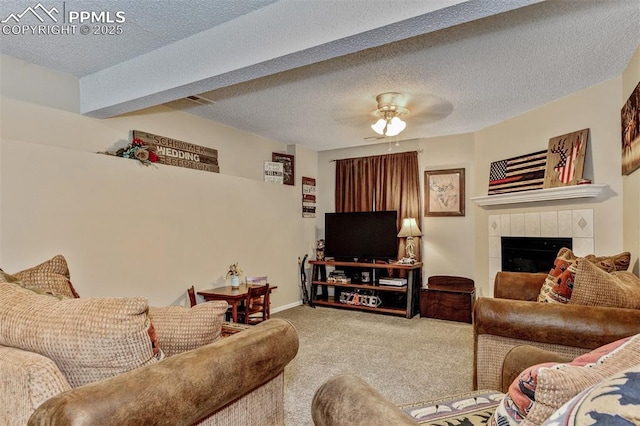 601 Harvest Field Way, Fountain, CO 80817 - living area featuring carpet, ceiling fan, and a tile fireplace