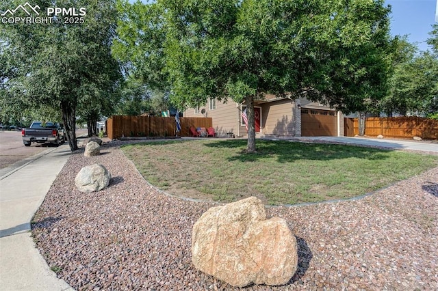 601 Harvest Field Way, Fountain, CO 80817 - view of front of home with a garage