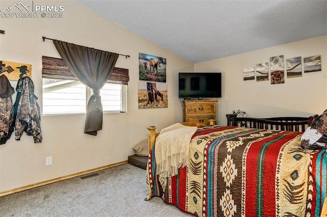 601 Harvest Field Way, Fountain, CO 80817 - carpeted bedroom featuring lofted ceiling and a textured ceiling