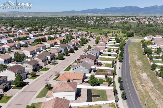 9444 Castle Oaks Dr, Fountain, CO 80817 - aerial view of residential area with a mountain backdrop