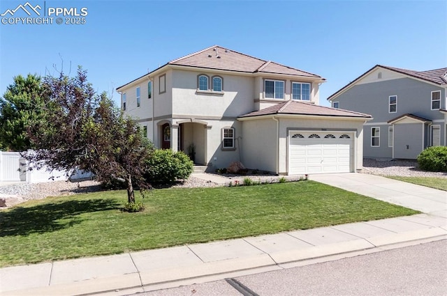 9444 Castle Oaks Dr, Fountain, CO 80817 - view of front of property with stucco siding, an attached garage, concrete driveway, a front lawn, and a tile roof