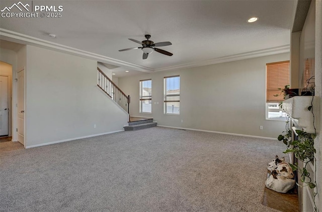 9444 Castle Oaks Dr, Fountain, CO 80817 - unfurnished living room featuring ceiling fan, carpet floors, recessed lighting, and stairway