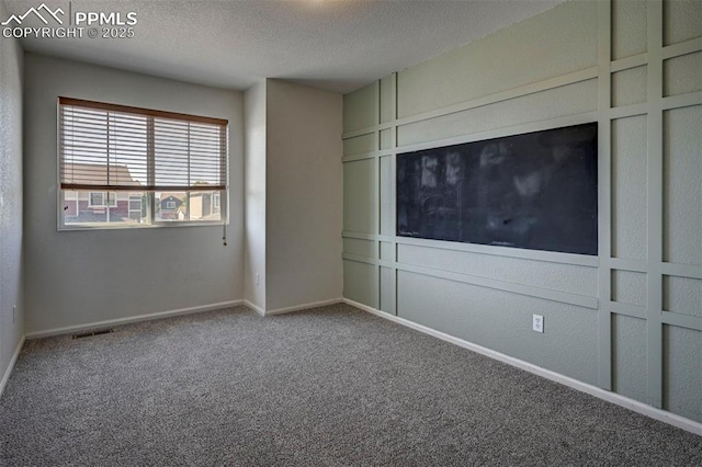 9444 Castle Oaks Dr, Fountain, CO 80817 - unfurnished bedroom featuring carpet and a textured ceiling