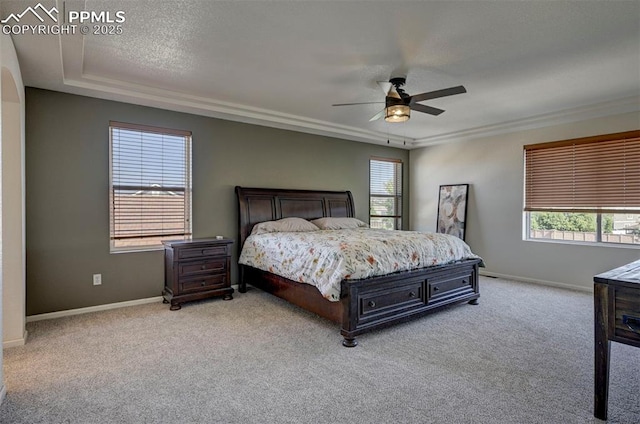 9444 Castle Oaks Dr, Fountain, CO 80817 - carpeted bedroom with multiple windows and ceiling fan