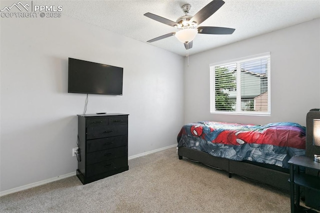 1360 Piros Dr, Colorado Springs, CO 80922 - carpeted bedroom featuring a textured ceiling and a ceiling fan