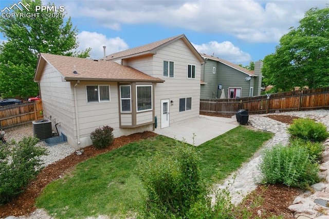 1360 Piros Dr, Colorado Springs, CO 80922 - rear view of property with a patio area, a fenced backyard, and a shingled roof