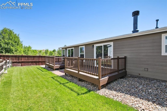 4680 Pika Pt, Colorado Springs, CO 80922 - back of property featuring a wooden deck