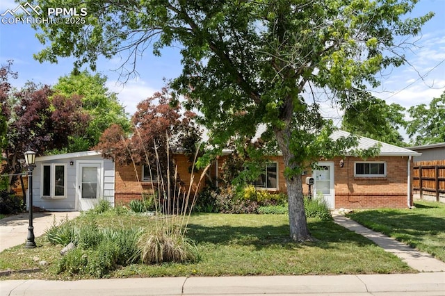 8991 Hickory Pl, Thornton, CO 80229 - view of front of house with brick siding