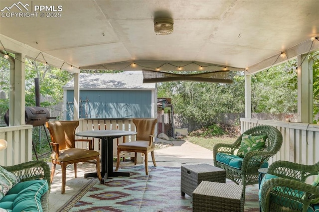 8991 Hickory Pl, Thornton, CO 80229 - view of patio / terrace with an outdoor hangout area and an outdoor structure