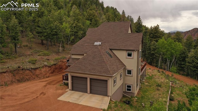 1522 Monarch Dr, Cripple Creek, CO 80813 - view from above of property featuring a heavily wooded area
