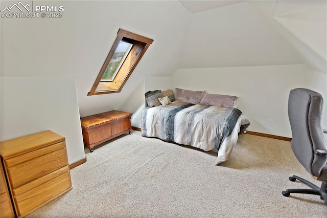1522 Monarch Dr, Cripple Creek, CO 80813 - carpeted bedroom with lofted ceiling and a skylight