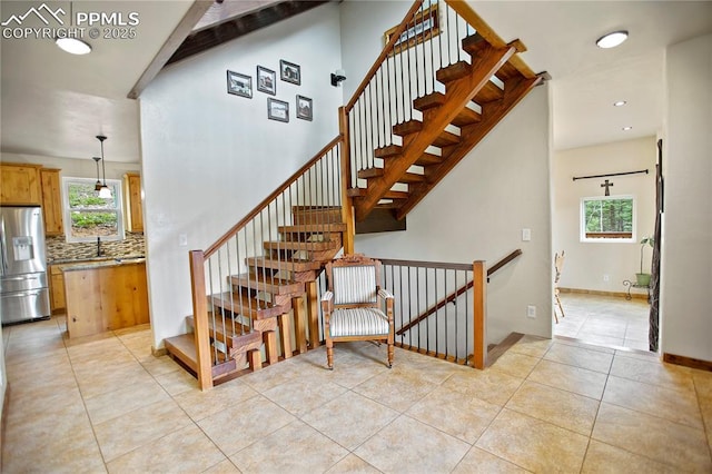 1522 Monarch Dr, Cripple Creek, CO 80813 - stairs with tile patterned flooring and recessed lighting