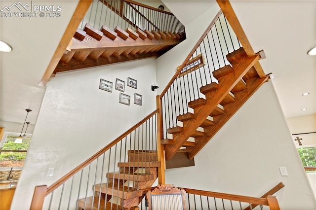 1522 Monarch Dr, Cripple Creek, CO 80813 - staircase featuring a high ceiling and recessed lighting