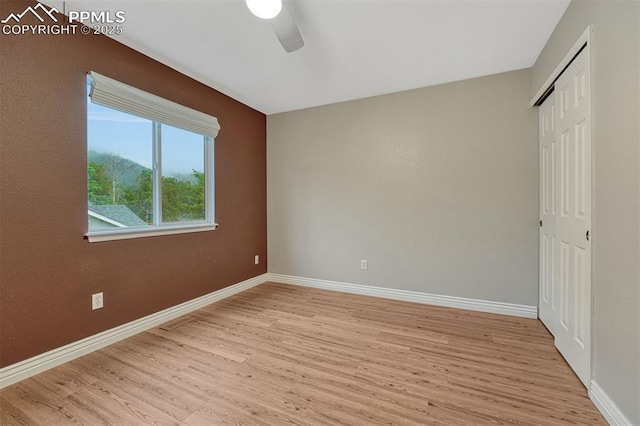 123 Wheat Ridge St, Palmer Lake, CO 80133 - unfurnished bedroom with light wood-type flooring, a closet, and ceiling fan