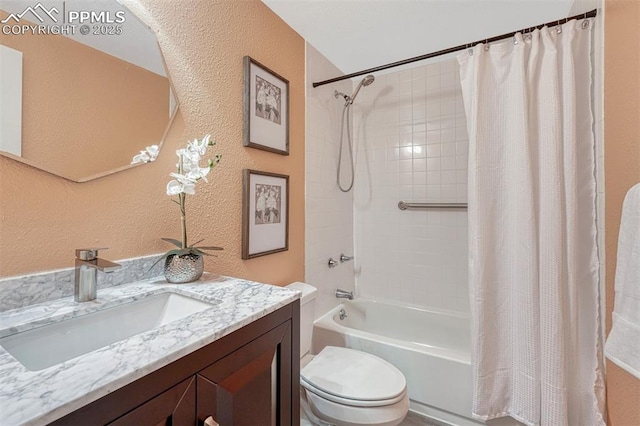 123 Wheat Ridge St, Palmer Lake, CO 80133 - bathroom with vanity, a textured wall, and shower / bath combo with shower curtain