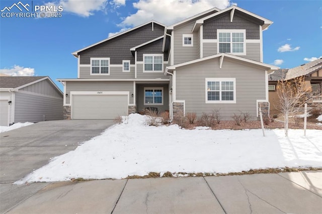 13437 Park Meadows Dr, Peyton, CO 80831 - craftsman house with asphalt driveway, an attached garage, and stone siding