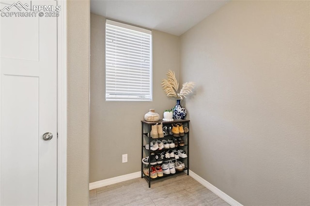 13437 Park Meadows Dr, Peyton, CO 80831 - hallway featuring baseboards