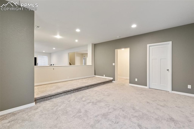 13437 Park Meadows Dr, Peyton, CO 80831 - unfurnished living room featuring carpet and recessed lighting